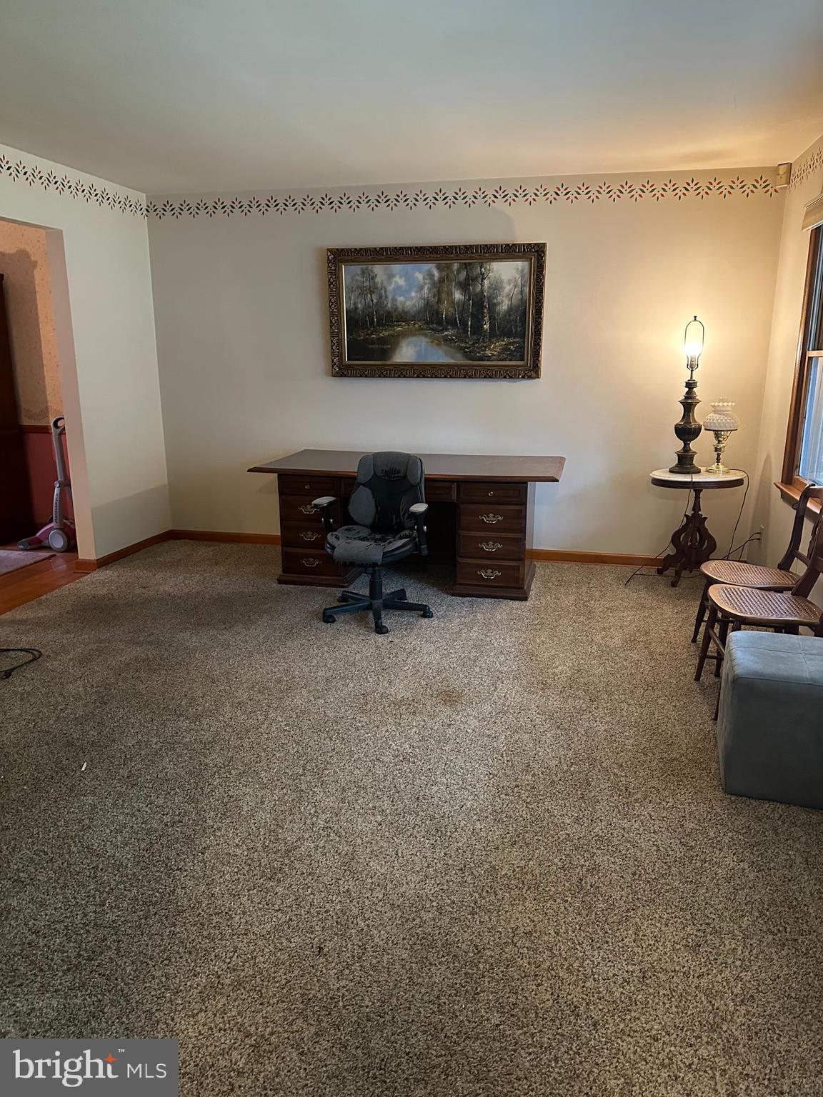 575 Centerton Road Elmer, NJ 08318 - Photo 18 of 28 a living room with furniture and a flat screen tv
