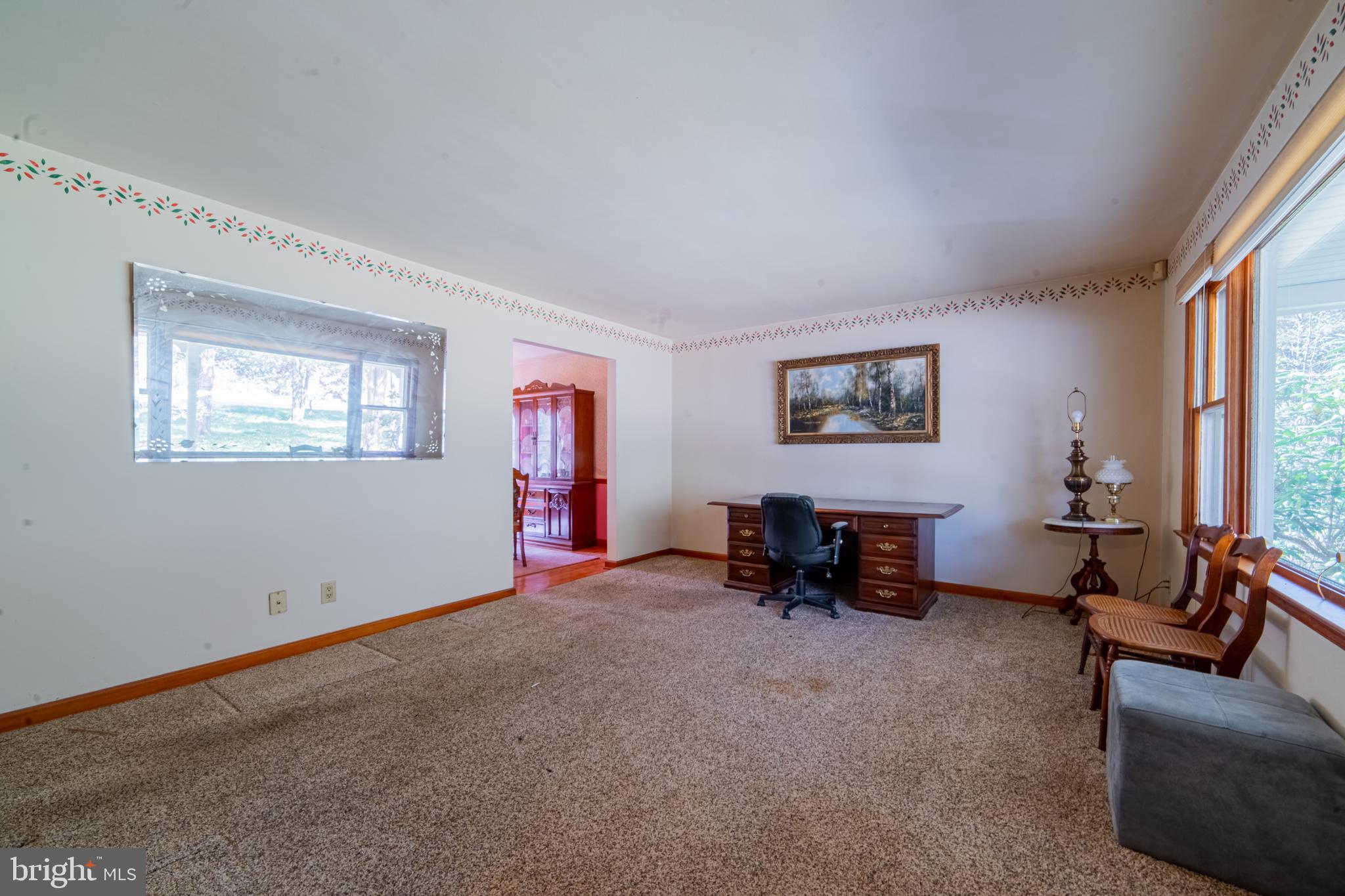 575 Centerton Road Elmer, NJ 08318 - Photo 22 of 28 a view of a livingroom with furniture and a window