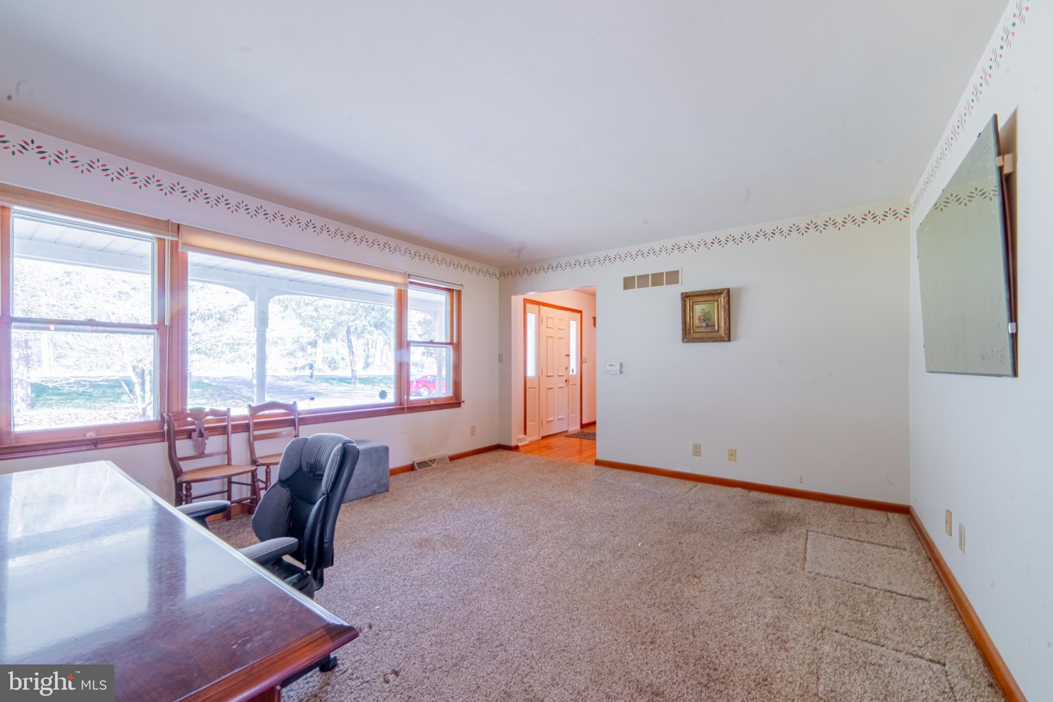 575 Centerton Road Elmer, NJ 08318 - Photo 23 of 28 a view of a livingroom with a lounge chair