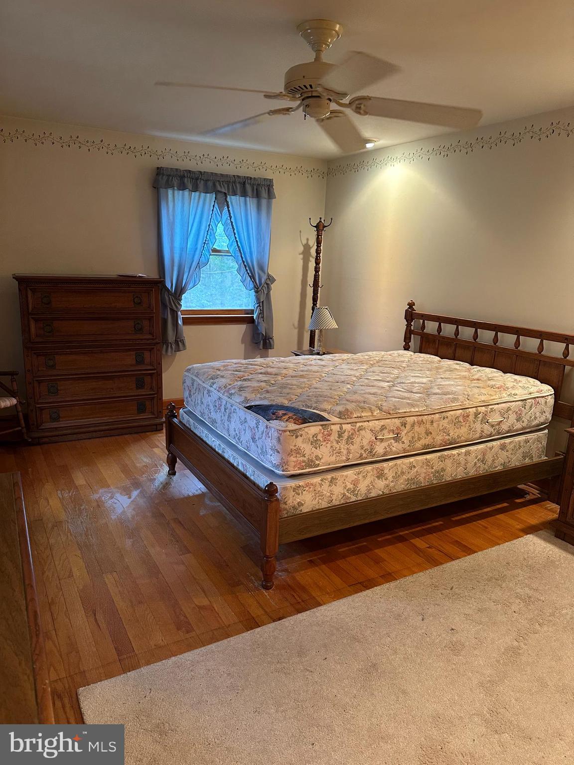 575 Centerton Road Elmer, NJ 08318 - Photo 25 of 28 a bed sitting in a room next to a window