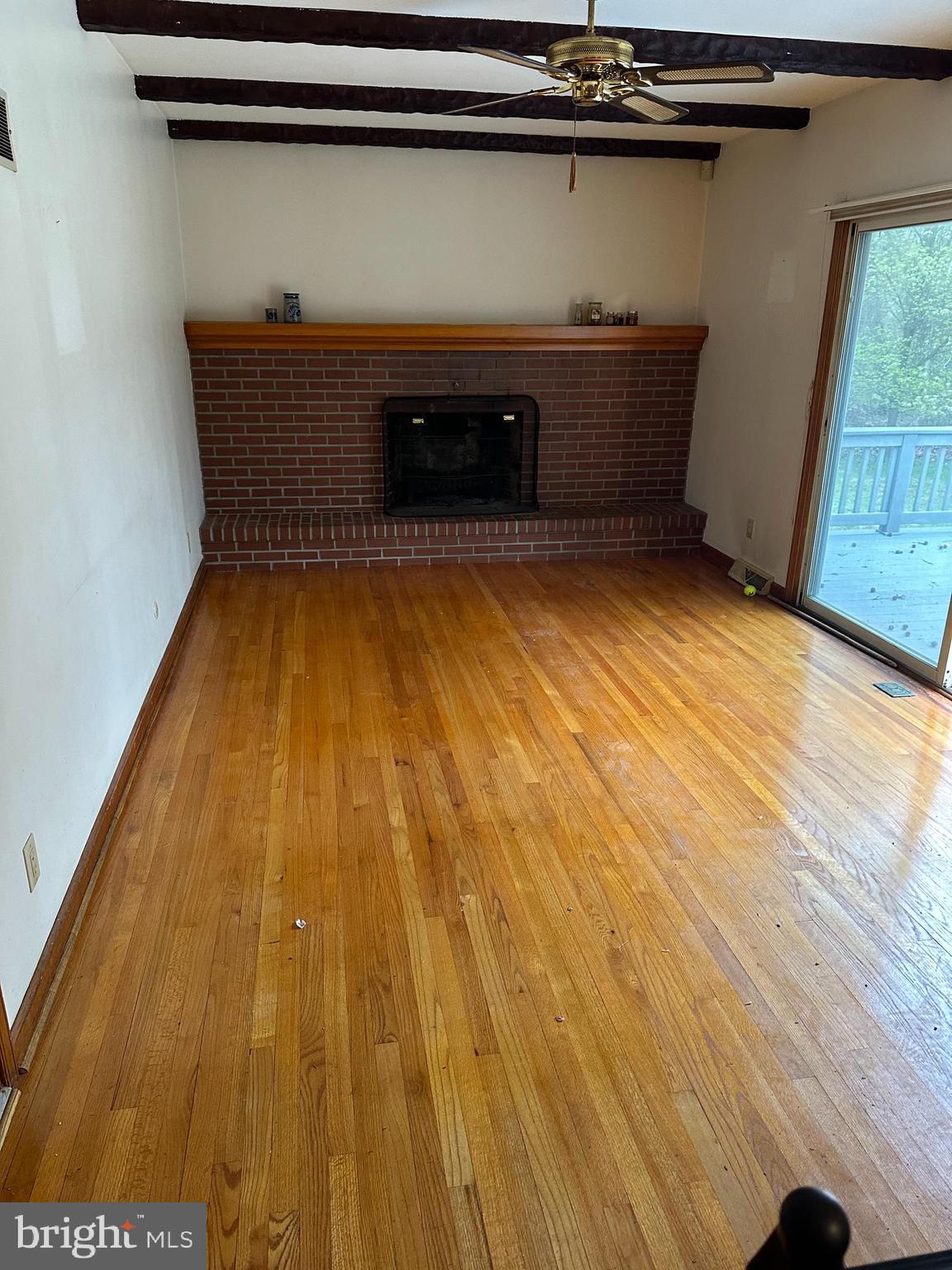 575 Centerton Road Elmer, NJ 08318 - Photo 5 of 28 a room with water heater and wooden floor