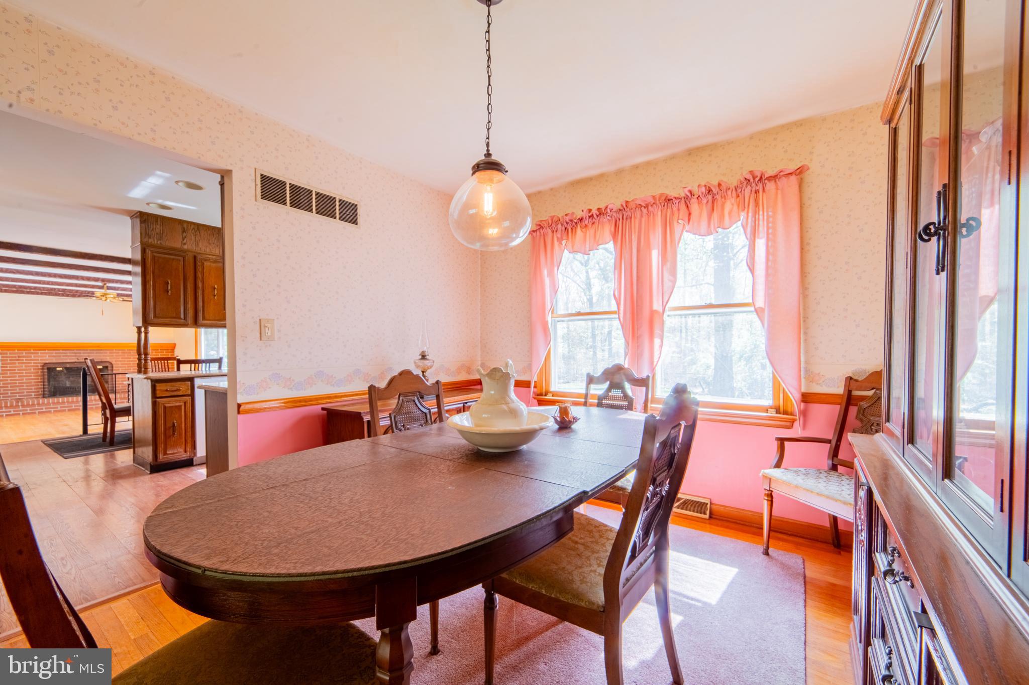 575 Centerton Road Elmer, NJ 08318 - Photo 8 of 28 a view of a dining room with furniture window and outside view