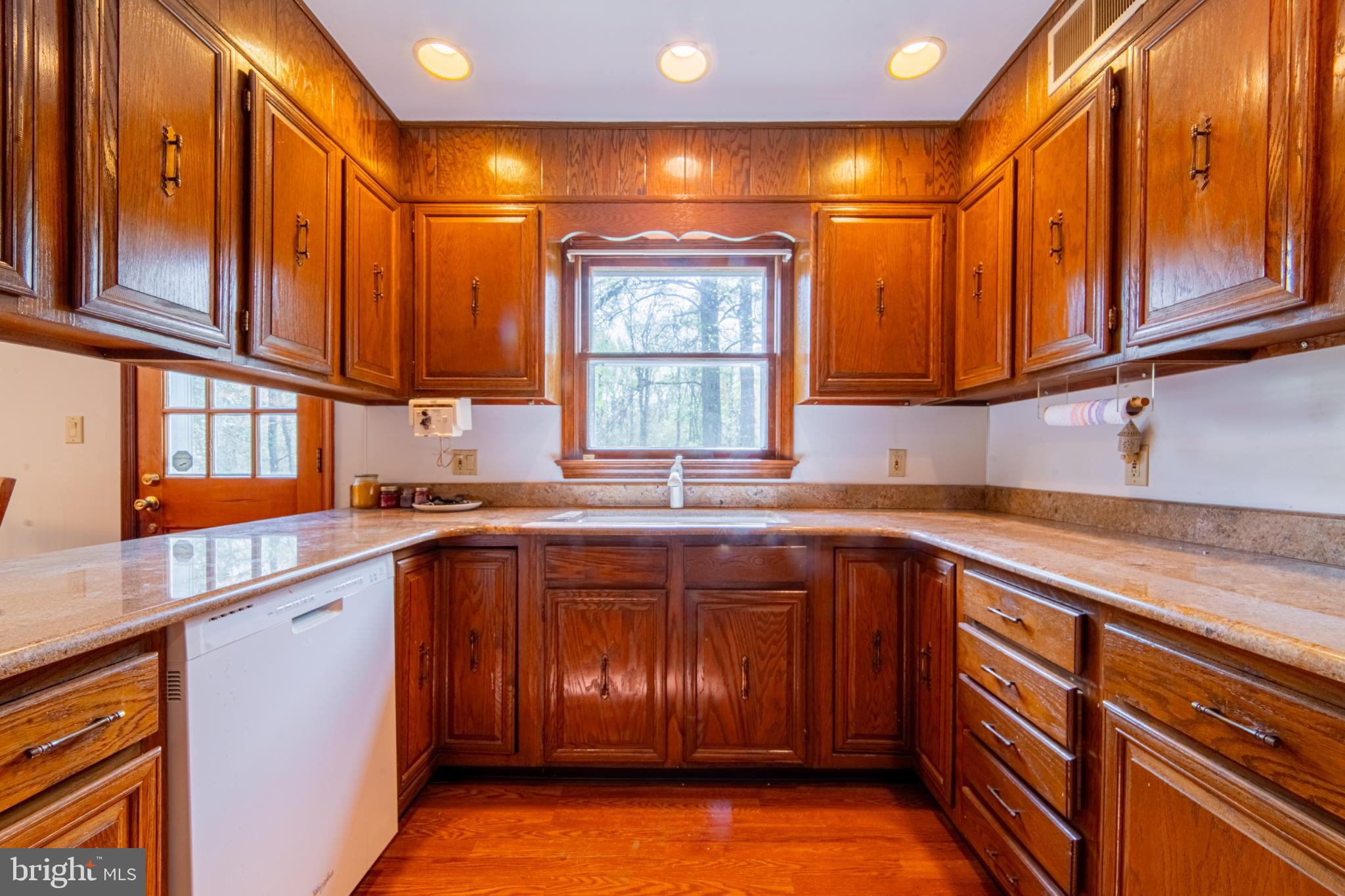 575 Centerton Road Elmer, NJ 08318 - Photo 9 of 28 a kitchen with stainless steel appliances granite countertop wooden cabinets a sink and dishwasher