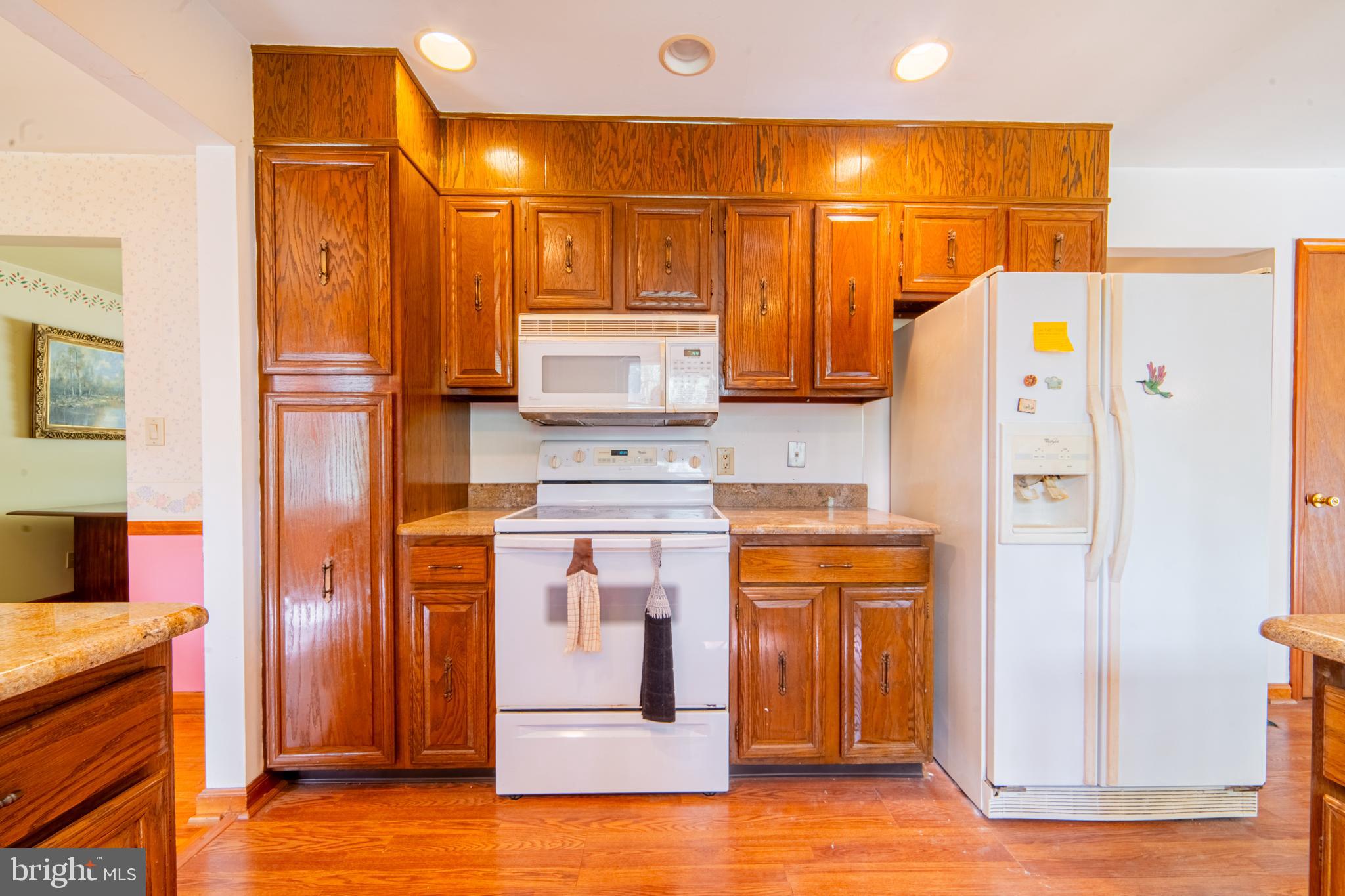 575 Centerton Road Elmer, NJ 08318 - Photo 10 of 28 a kitchen with stainless steel appliances a refrigerator and a stove