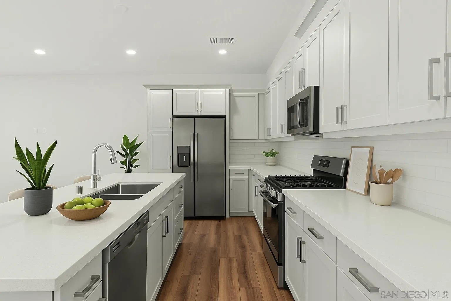 2104 Bluestone Circle Chula Vista, CA 91913 - Photo 3 of 21 a kitchen with a sink a stove and refrigerator