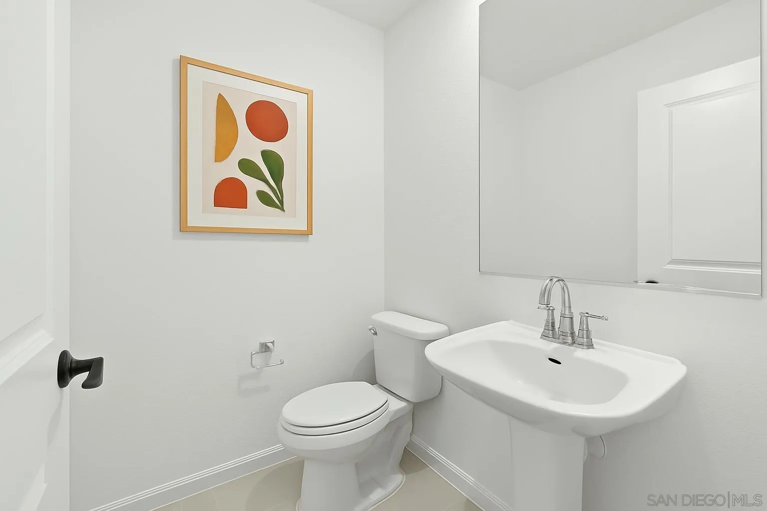 2104 Bluestone Circle Chula Vista, CA 91913 - Photo 6 of 21 a bathroom with a sink mirror and toilet