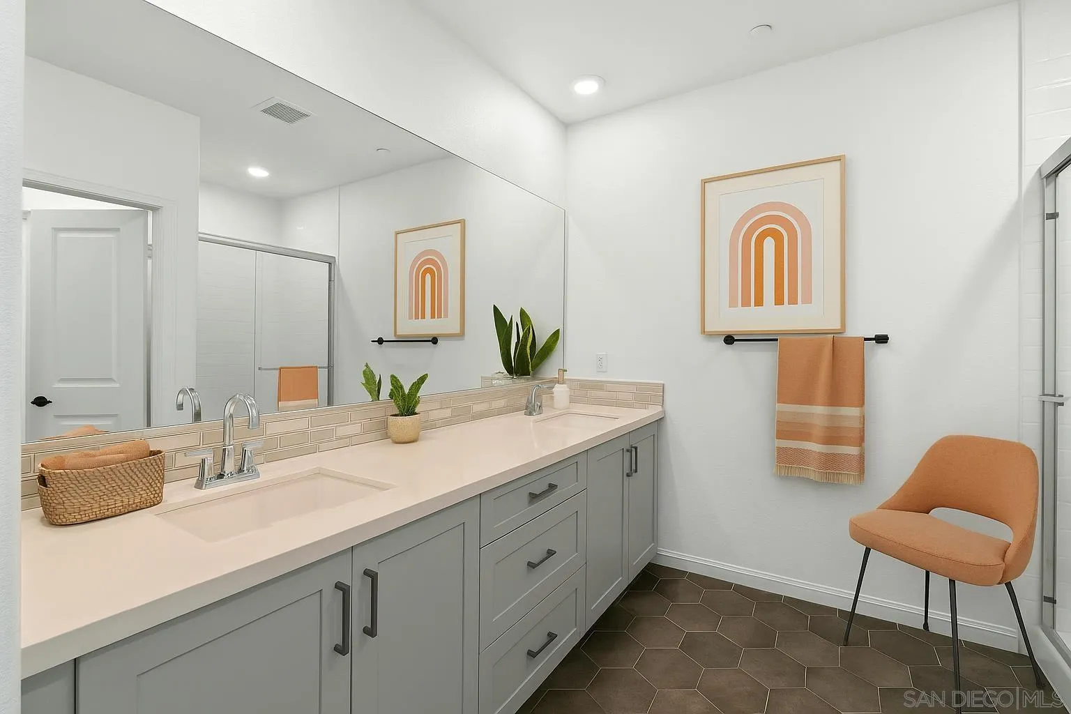 2104 Bluestone Circle Chula Vista, CA 91913 - Photo 9 of 21 a spacious bathroom with a double vanity sink and a mirror