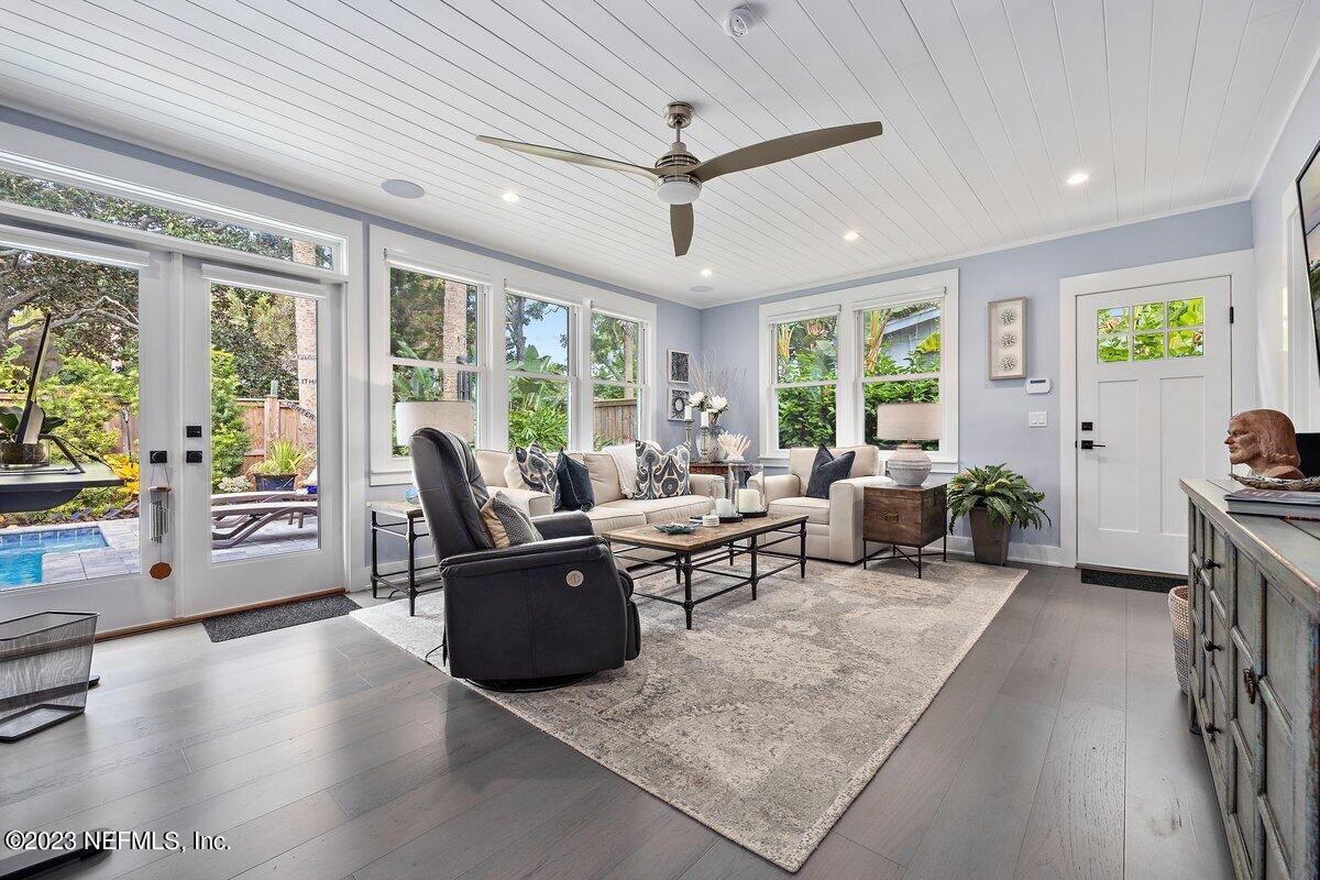 1320 4th Street Neptune Beach, FL 32266 - Photo 1 of 30 a living room with furniture and a large window