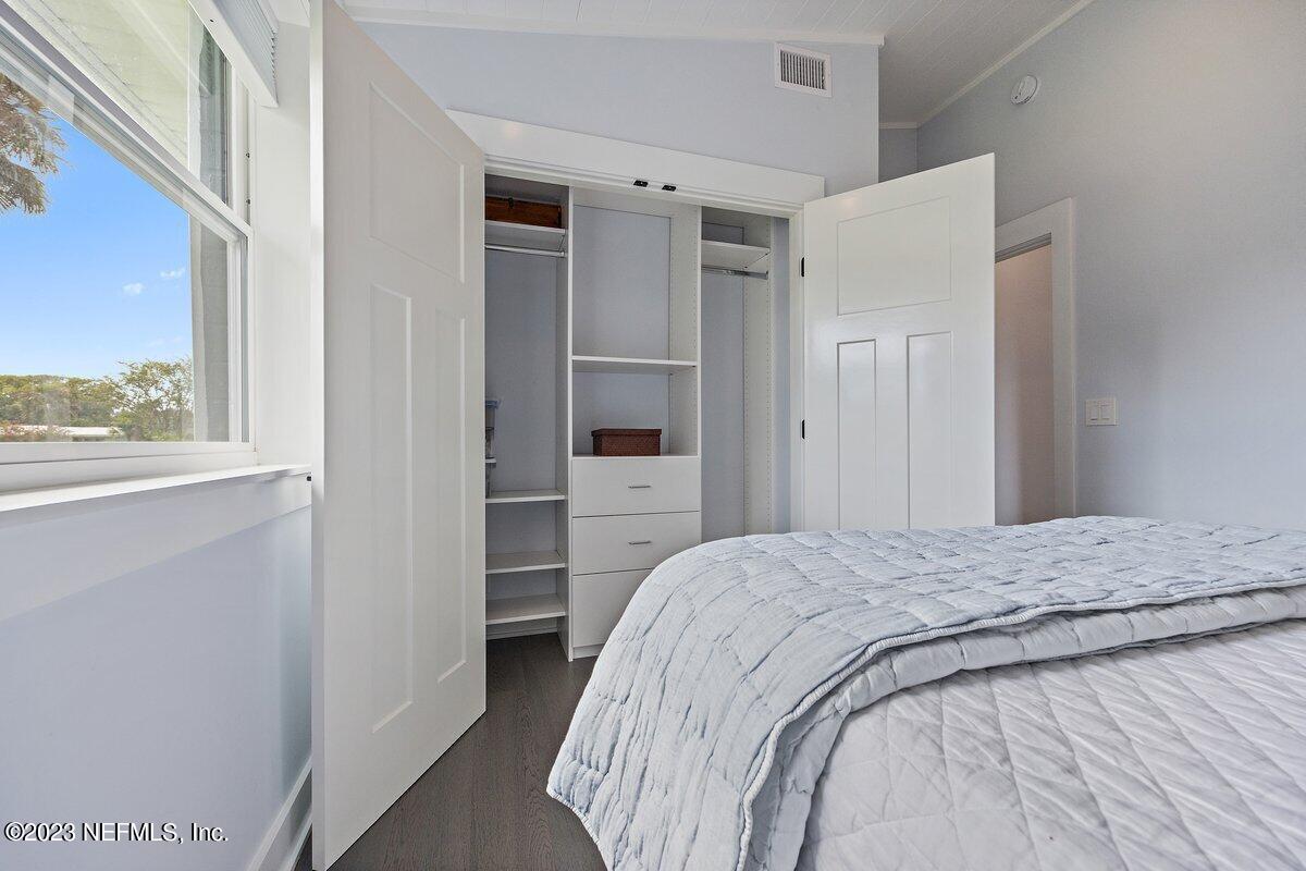 1320 4th Street Neptune Beach, FL 32266 - Photo 14 of 30 a bedroom with a bed and a window