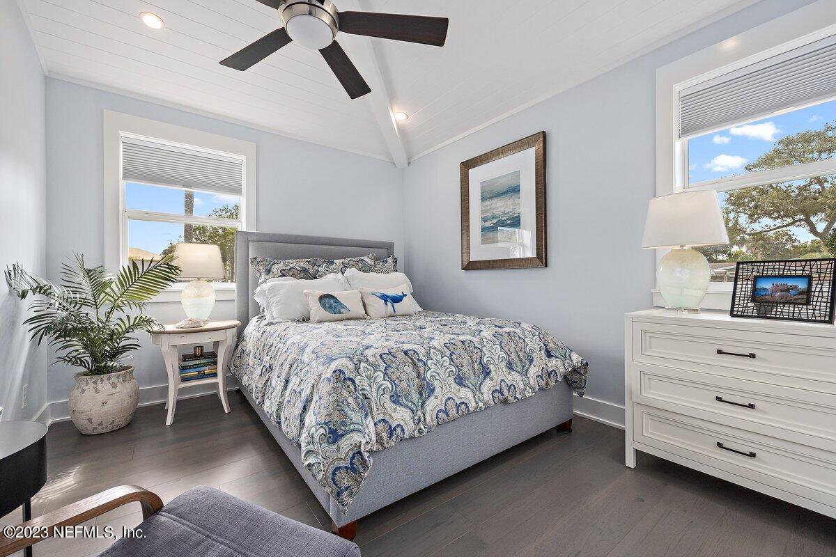 1320 4th Street Neptune Beach, FL 32266 - Photo 16 of 30 a bedroom with a bed and ceiling fan