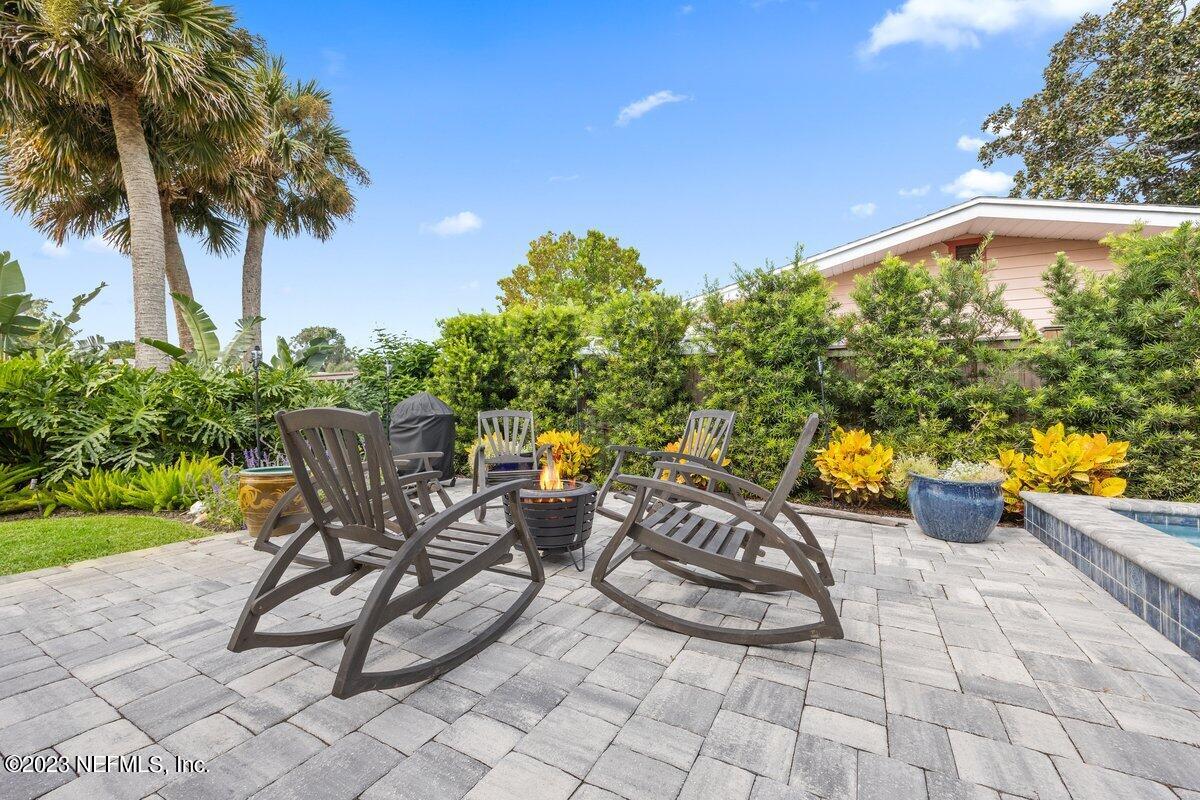 1320 4th Street Neptune Beach, FL 32266 - Photo 21 of 30 a view of a backyard with sitting area