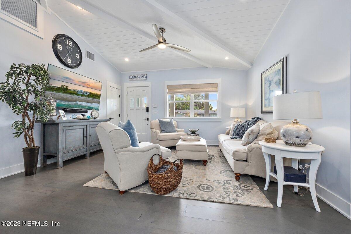 1320 4th Street Neptune Beach, FL 32266 - Photo 5 of 30 a living room with furniture kitchen view and a large window