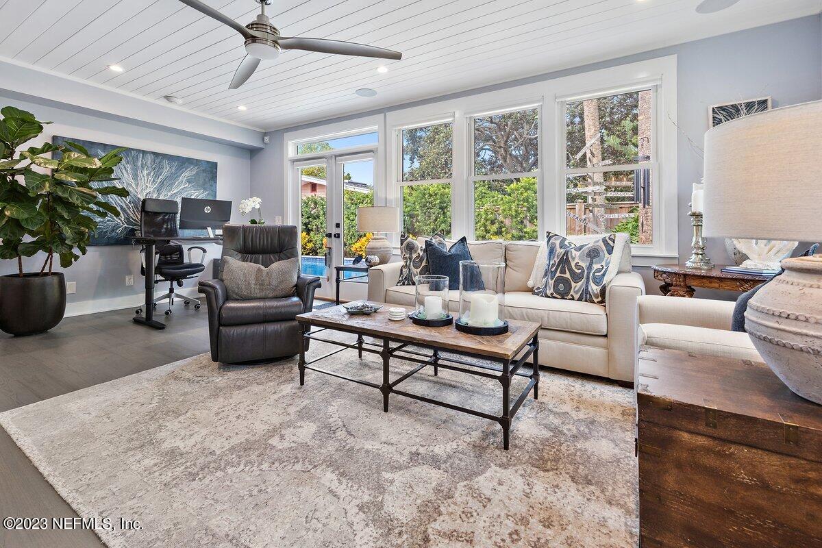 1320 4th Street Neptune Beach, FL 32266 - Photo 10 of 30 a living room with furniture and a large window