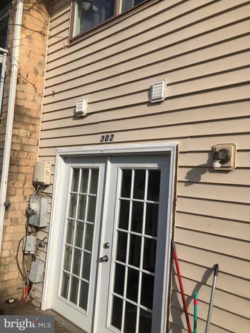 a view of a wooden house with a window