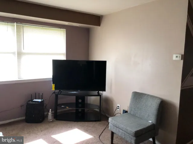 a kitchen with a sink and a window