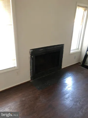 a living room with a fireplace