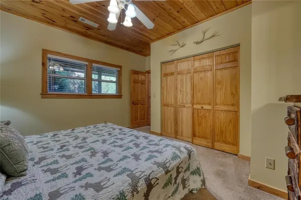 a bedroom with furniture and a fireplace