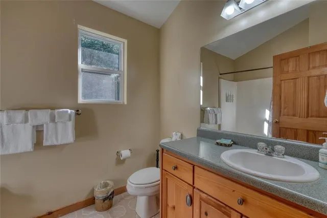 a view of patio with couple of chairs