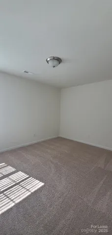 a view of a room with an empty space