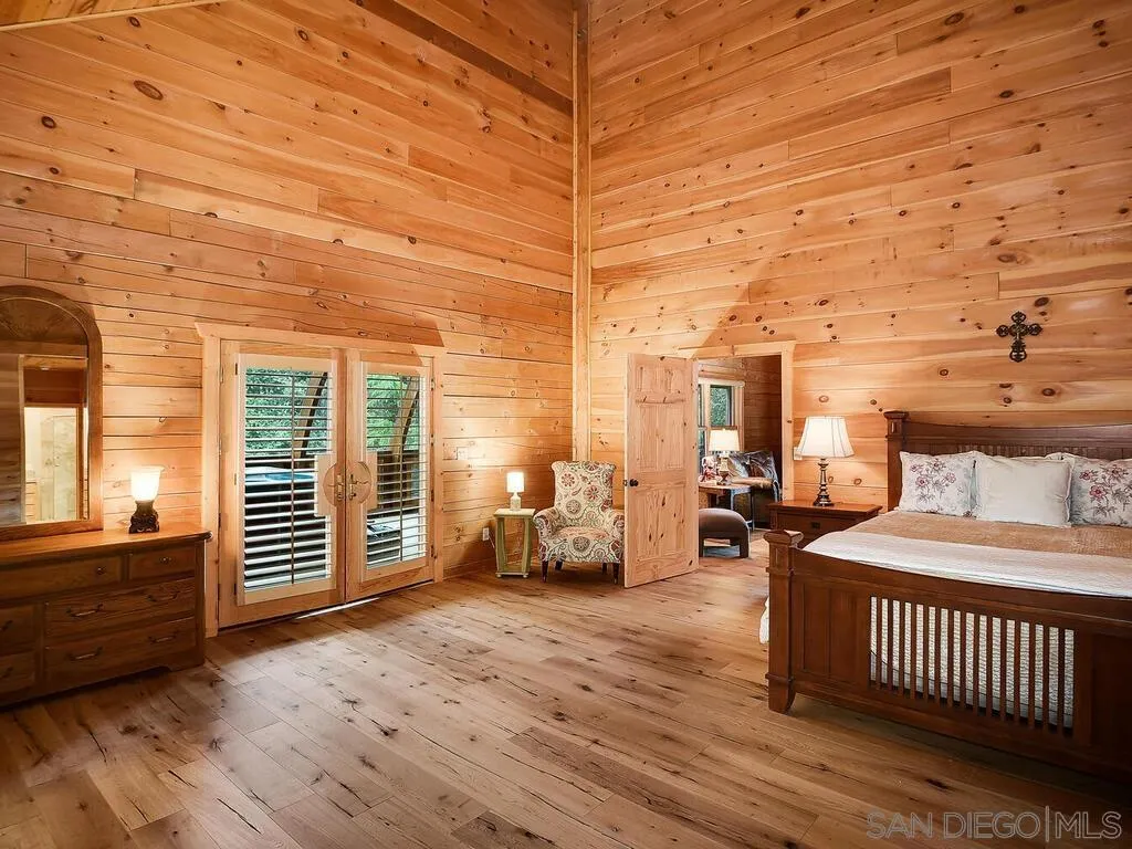 1068 West Incense Cedar Road Julian, CA 92036 - Photo 17 of 63 a bedroom with furniture and wooden floor