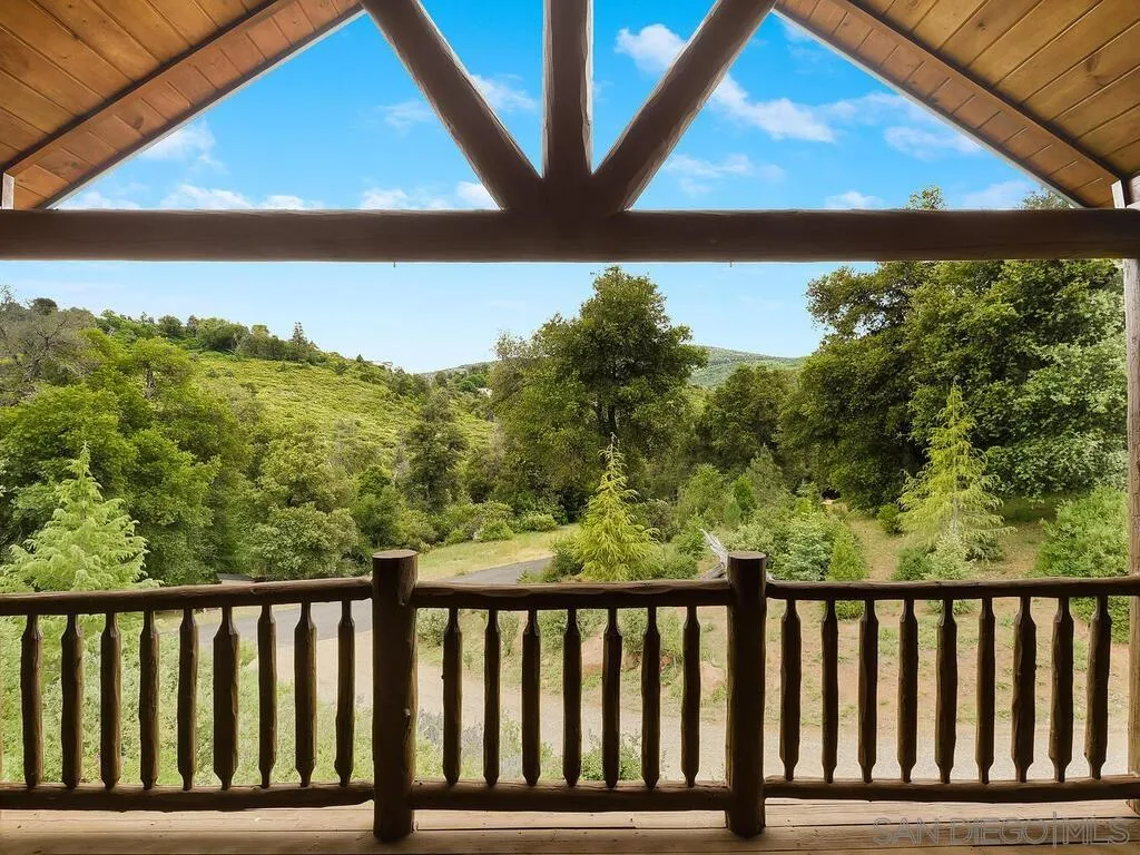 1068 West Incense Cedar Road Julian, CA 92036 - Photo 4 of 63 a balcony with wooden floor