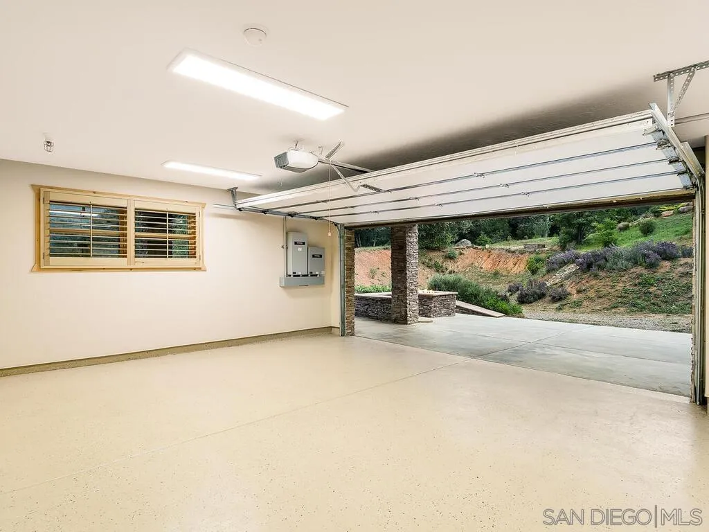 1068 West Incense Cedar Road Julian, CA 92036 - Photo 49 of 63 a view of a room with a large window and wooden floor