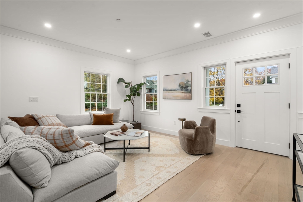 63 Oak Street, Unit B Wellesley, MA 02482 - Photo 12 of 26 a living room with furniture and windows
