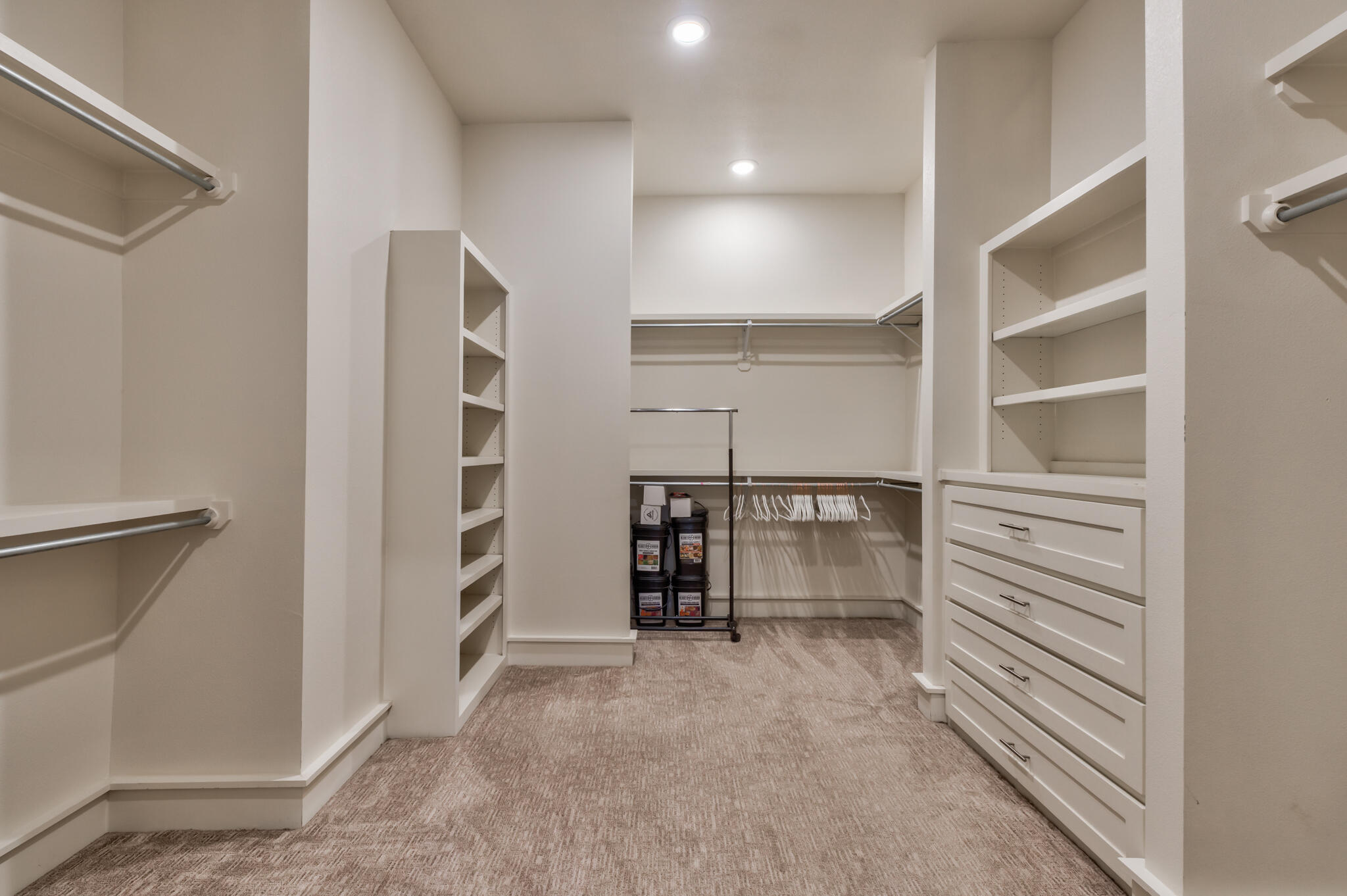 5303 110th Street Lubbock, TX 79424 - Photo 48 of 55 a view of walk in closet with empty racks