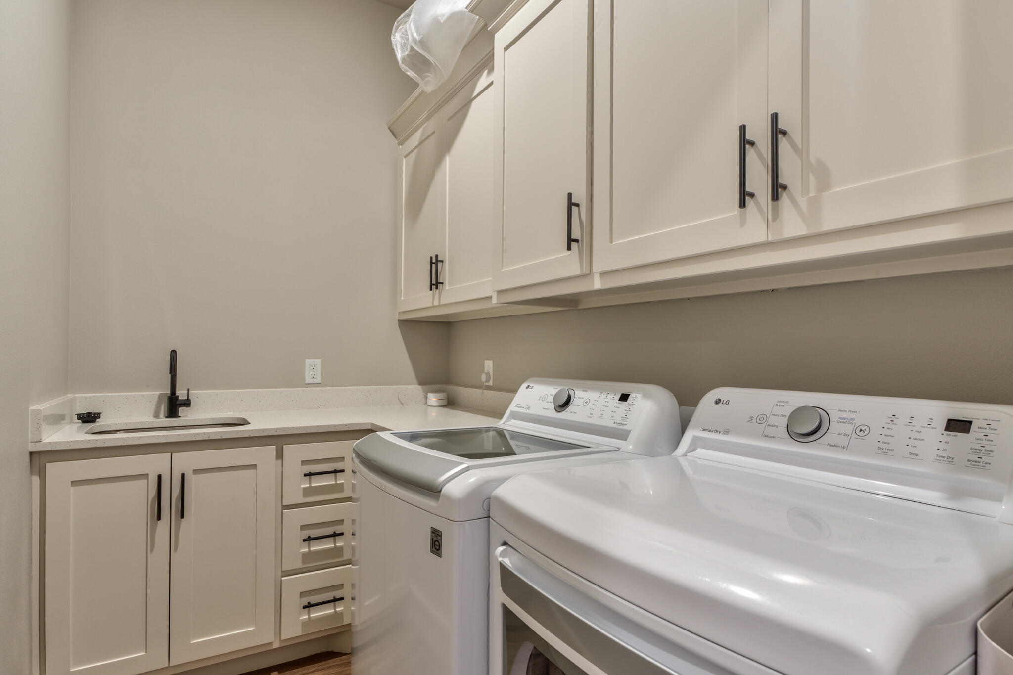 5303 110th Street Lubbock, TX 79424 - Photo 50 of 55 a utility room with dryer and washer