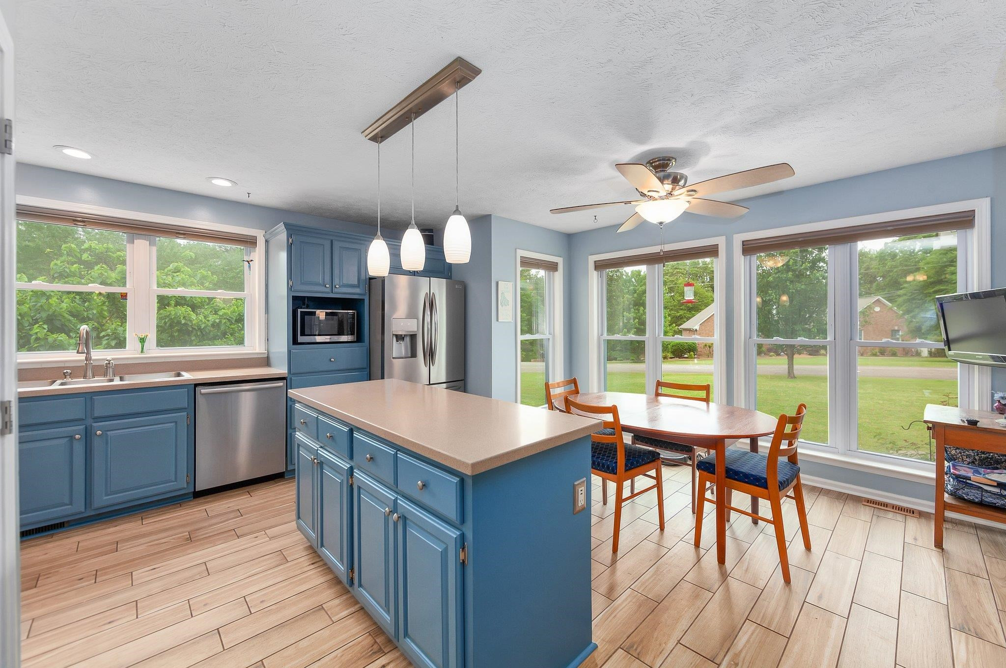 65 Jennalee Lane Medon, TN 38356 - Photo 11 of 43 a large kitchen with kitchen island a large island in it