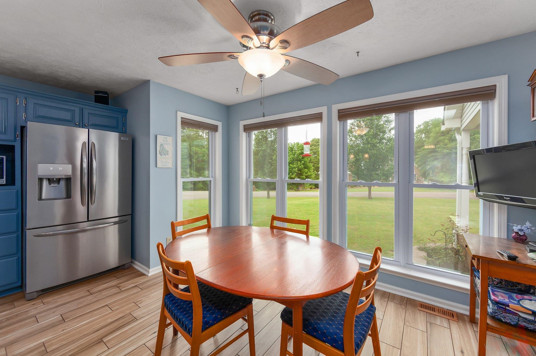65 Jennalee Lane Medon, TN 38356 - Photo 12 of 43 a view of a dining room with furniture window and wooden floor
