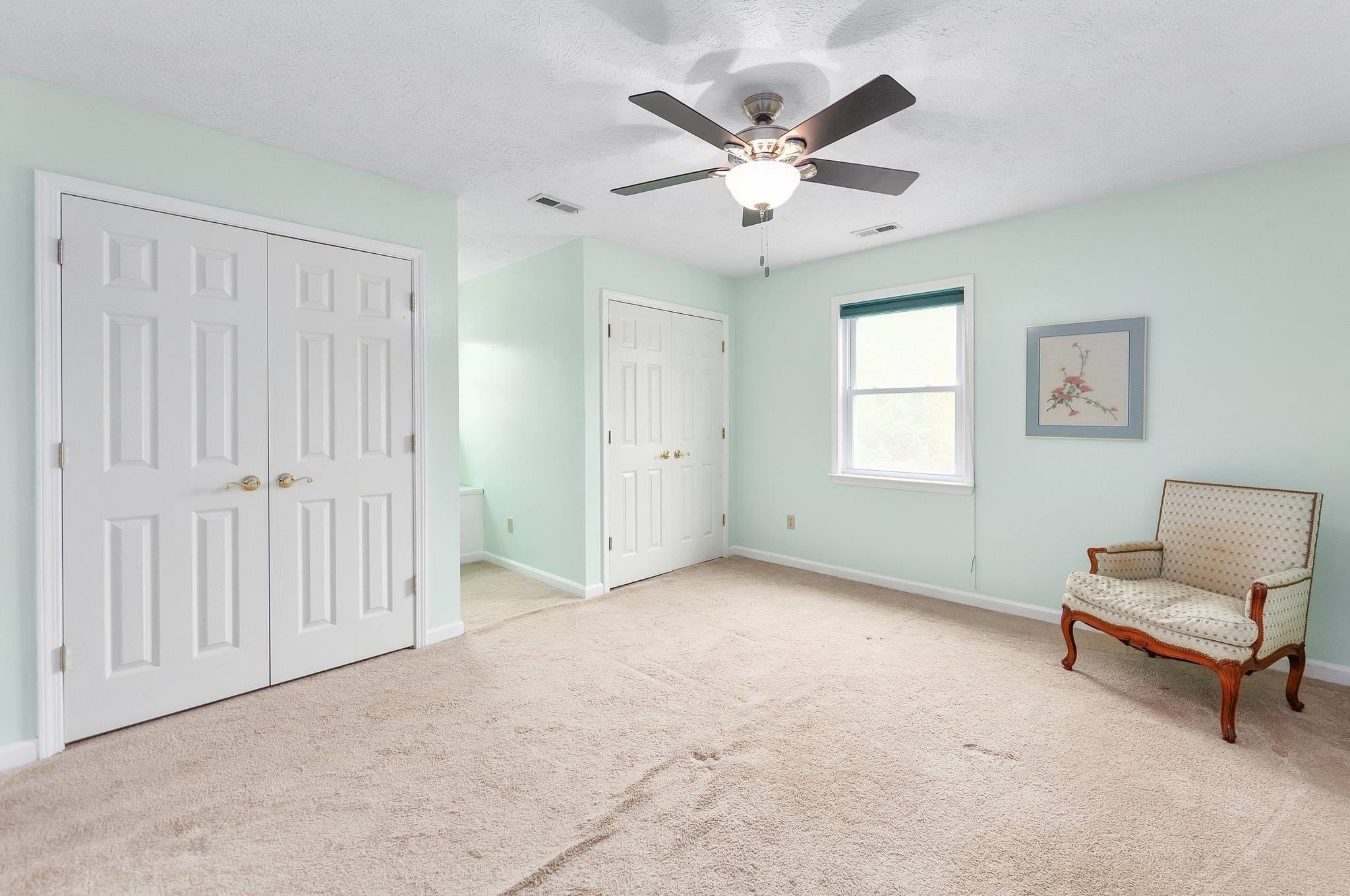 65 Jennalee Lane Medon, TN 38356 - Photo 20 of 43 an empty room with windows and fan
