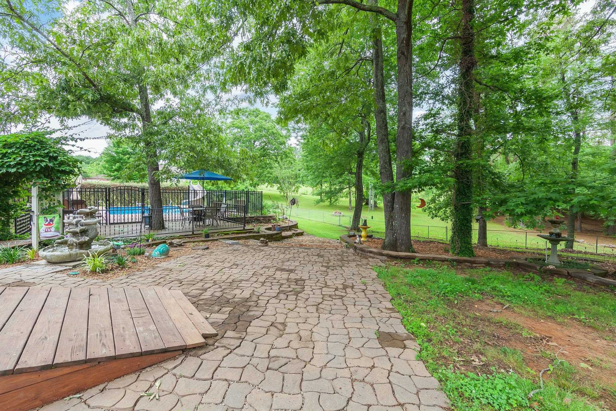 65 Jennalee Lane Medon, TN 38356 - Photo 29 of 43 a view of a backyard with sitting area