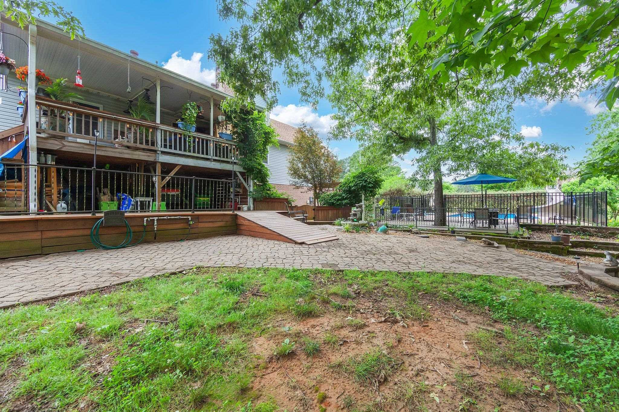 65 Jennalee Lane Medon, TN 38356 - Photo 30 of 43 a view of a building with a yard