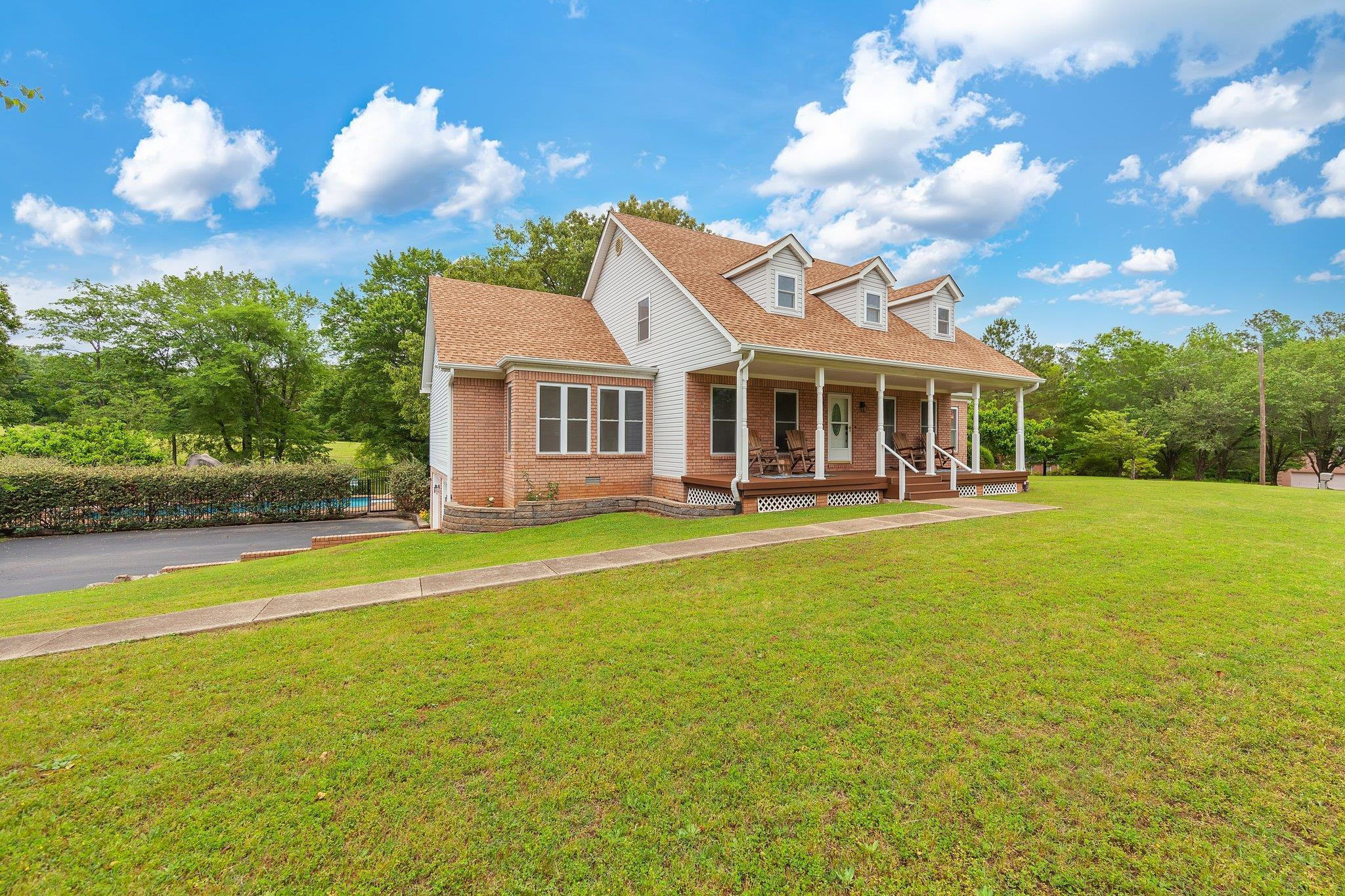 65 Jennalee Lane Medon, TN 38356 - Photo 37 of 43 a view of a house with a swimming pool