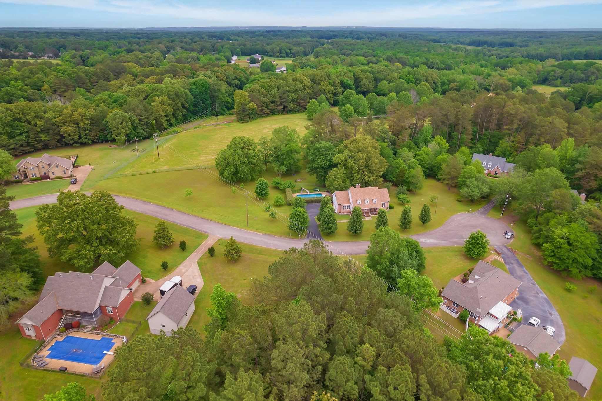 65 Jennalee Lane Medon, TN 38356 - Photo 39 of 43 an aerial view of residential houses with outdoor space and street view