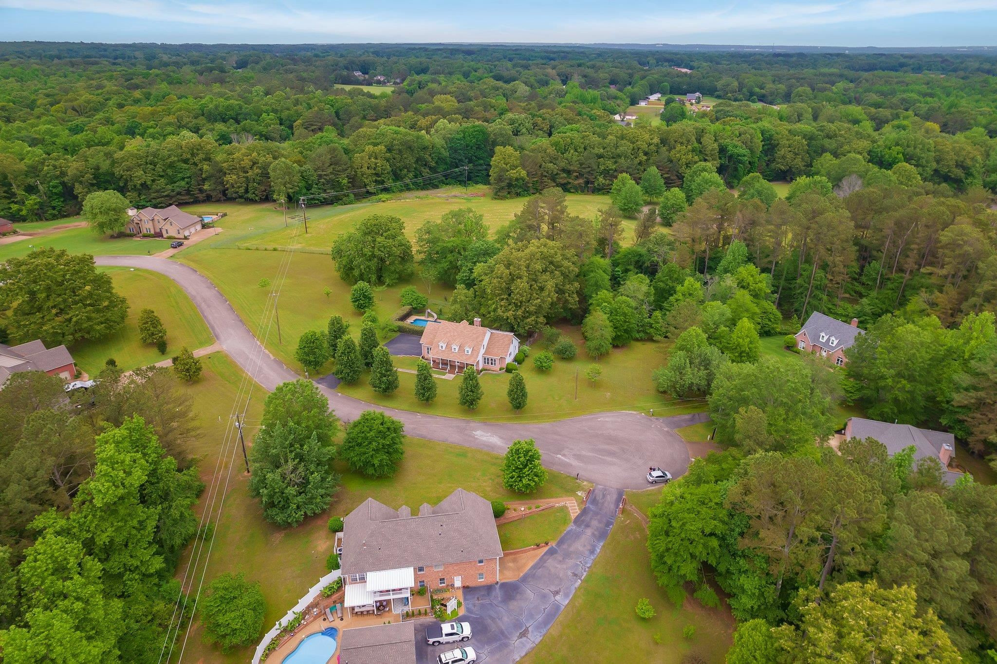 65 Jennalee Lane Medon, TN 38356 - Photo 40 of 43 an aerial view of residential house with outdoor space and swimming pool