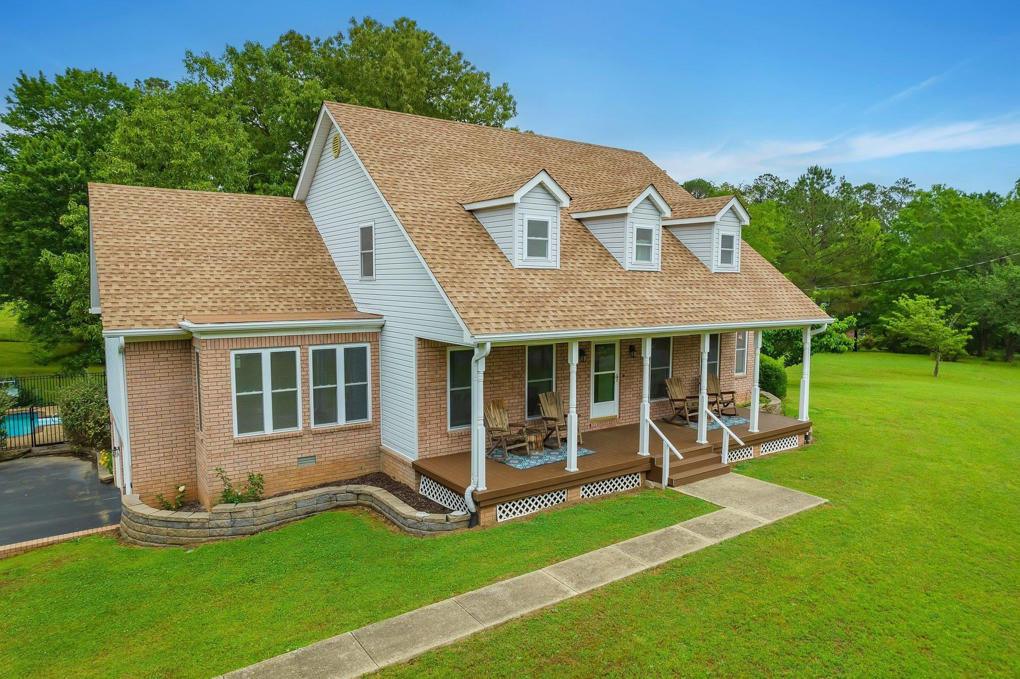65 Jennalee Lane Medon, TN 38356 - Photo 42 of 43 front view of a house with a yard