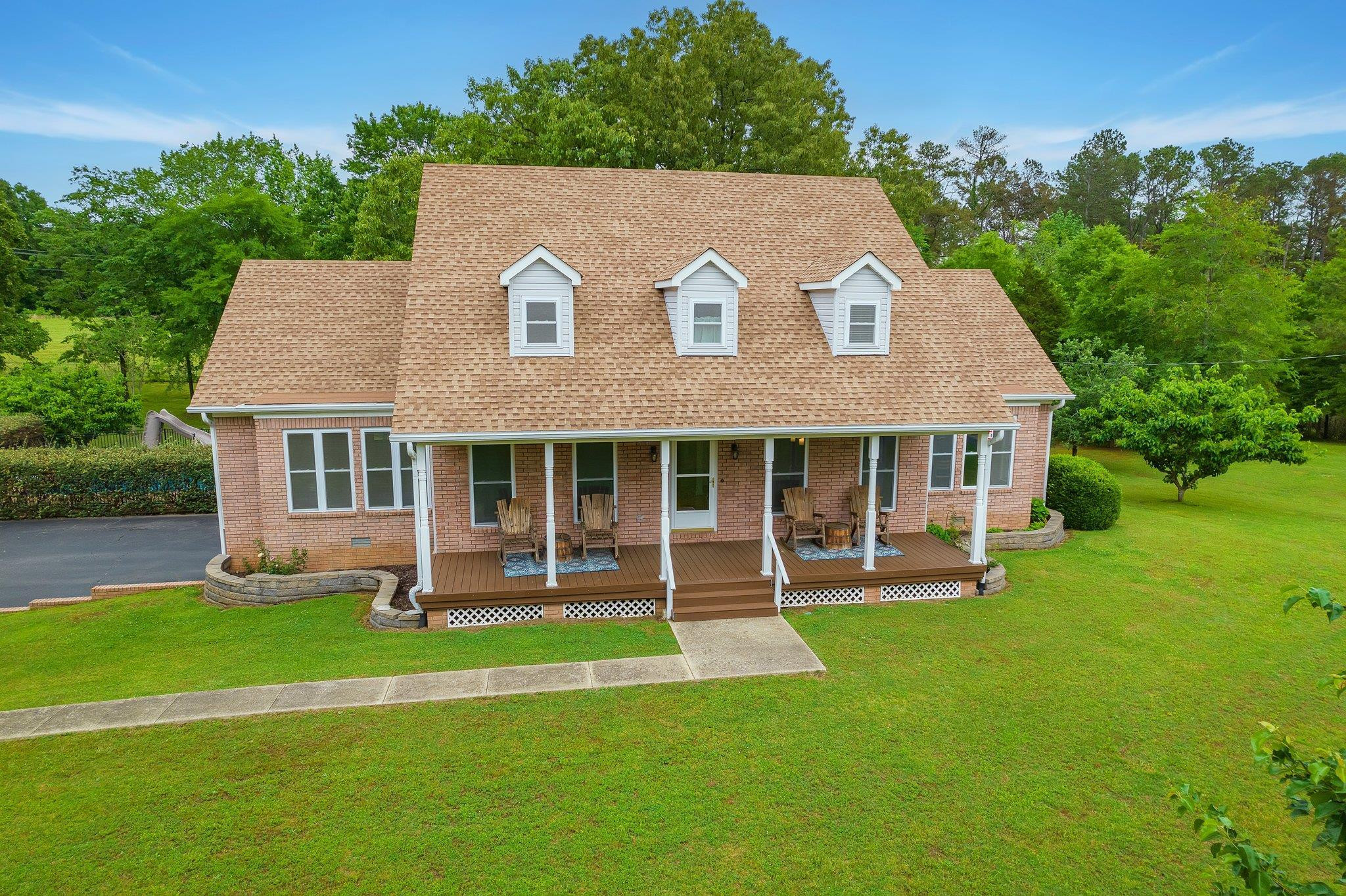 65 Jennalee Lane Medon, TN 38356 - Photo 43 of 43 a view of a house with a yard and sitting area