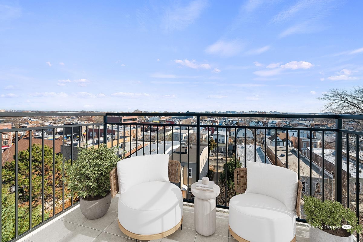 a view of a balcony with chairs