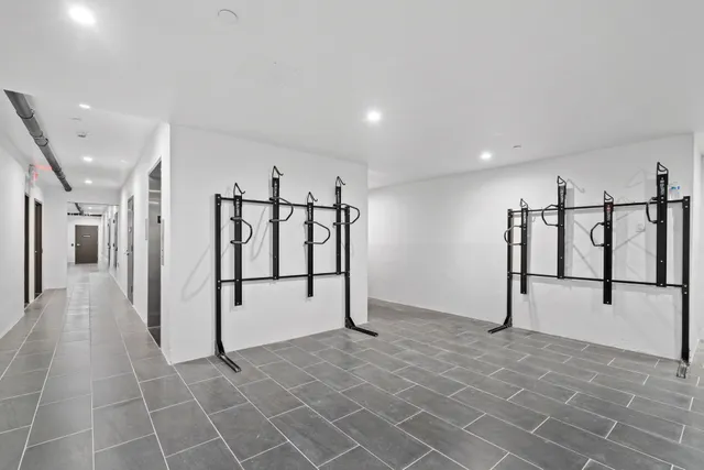 a view of staircase with white walls