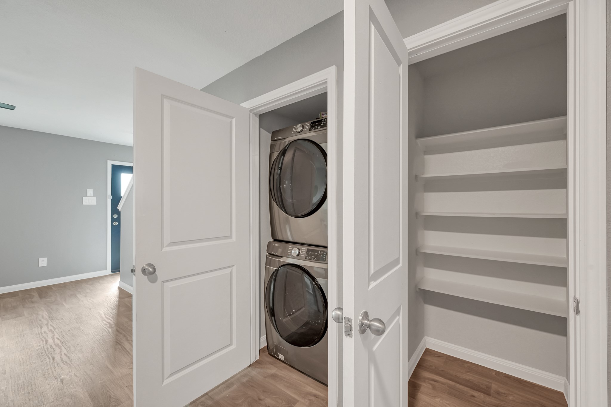 16399 Jasmine Marie Place Conroe, TX 77306 - Photo 7 of 22 a utility room with dryer and washer