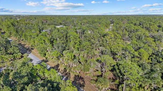 a view of a yard with an outdoor space