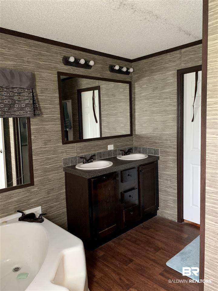 21519 Bengston Road Robertsdale, AL 36567 - Photo 10 of 15 Double Vanity and Walk-in closet
