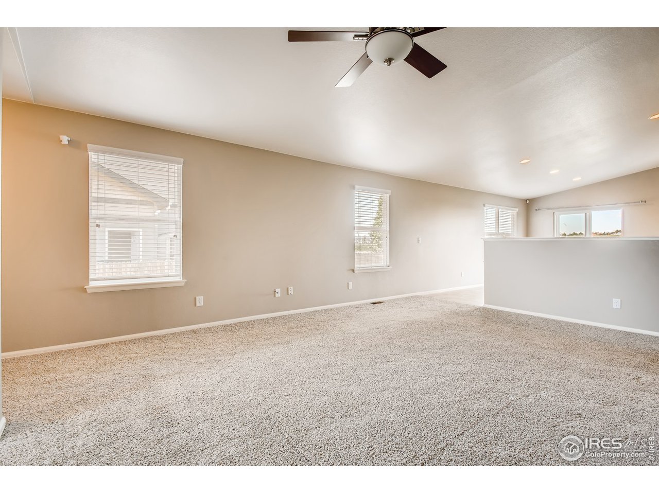 8663 Raspberry Drive Frederick, CO 80504 - Photo 12 of 33 a view of an empty room with a window