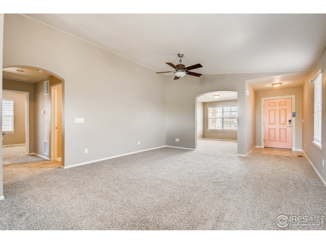 8663 Raspberry Drive Frederick, CO 80504 - Photo 13 of 33 a view of a livingroom with a fireplace