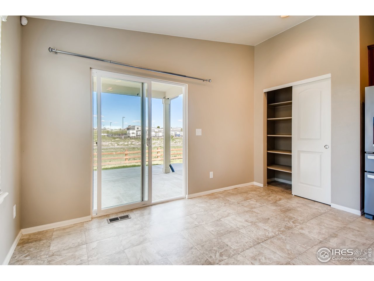 8663 Raspberry Drive Frederick, CO 80504 - Photo 10 of 33 an empty room with closet and entryway