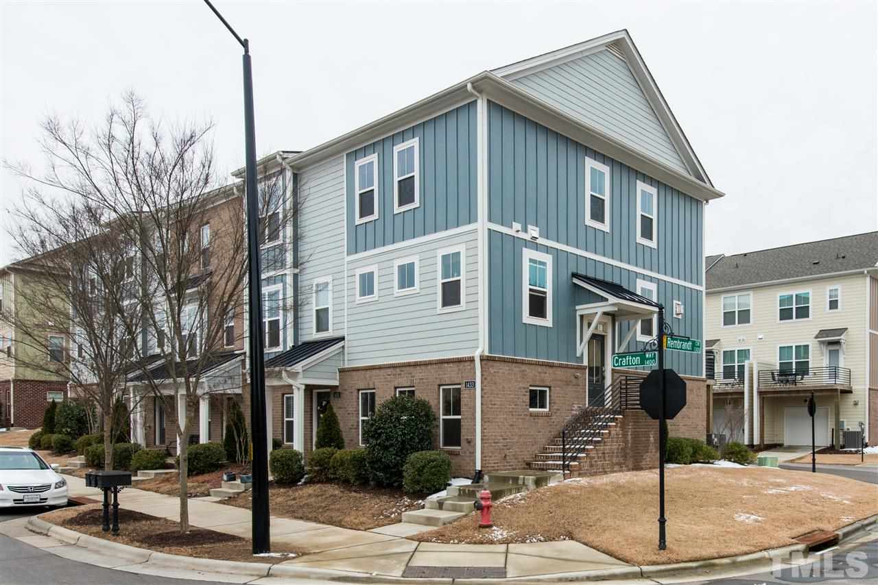 1433 Crafton Way Raleigh, NC 27607 - Photo 1 of 23 a front view of a building with street