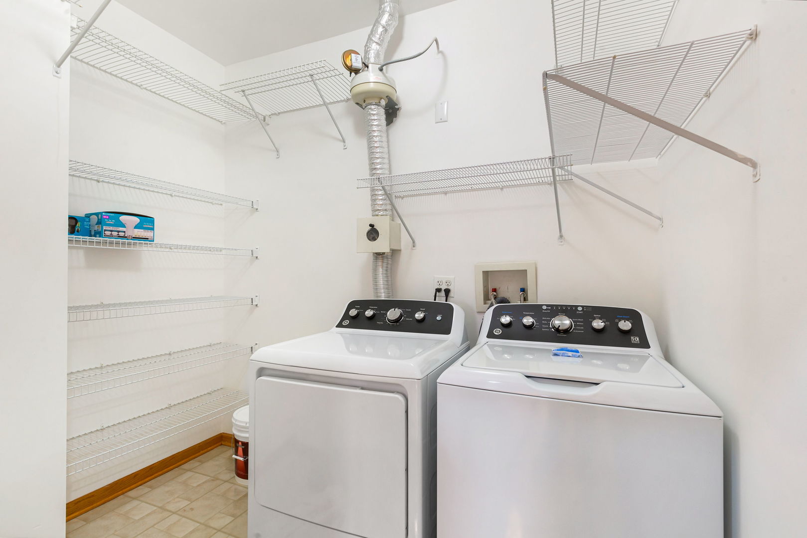 1259 West Lake Street, Unit 203 Addison, IL 60101 - Photo 15 of 17 a utility room with dryer and washer