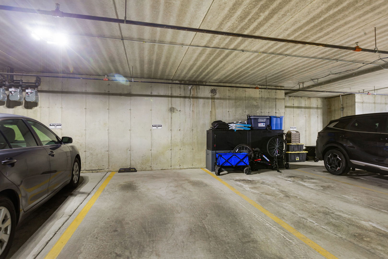 1259 West Lake Street, Unit 203 Addison, IL 60101 - Photo 16 of 17 a view of parking garage with cars parked